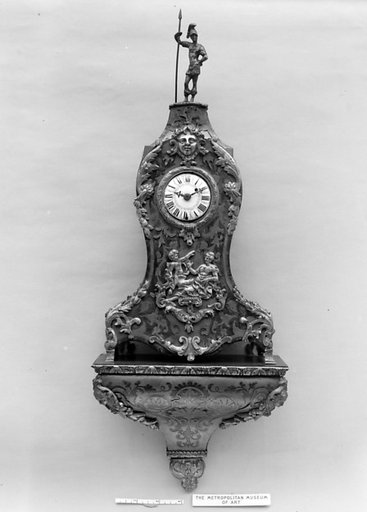 Clock with bracket