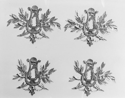 Set of four keyhole escutcheons