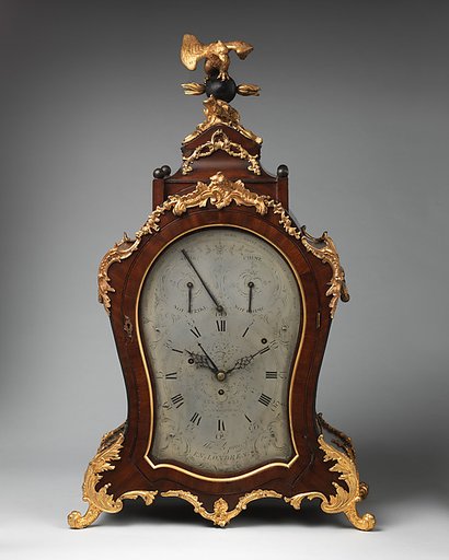 Musical bracket clock with calendar