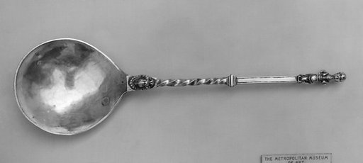 Figure-top spoon
