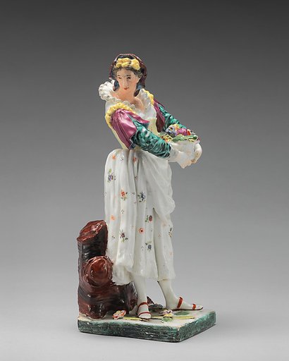 Woman carrying a basket of flowers
