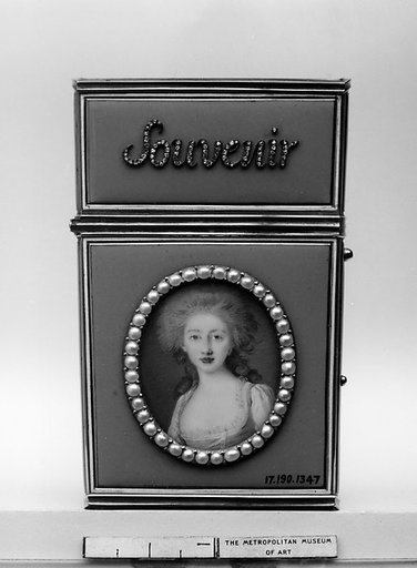 Souvenir with portraits of a man and a woman