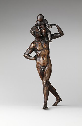 Man Carrying a Child on His Shoulder