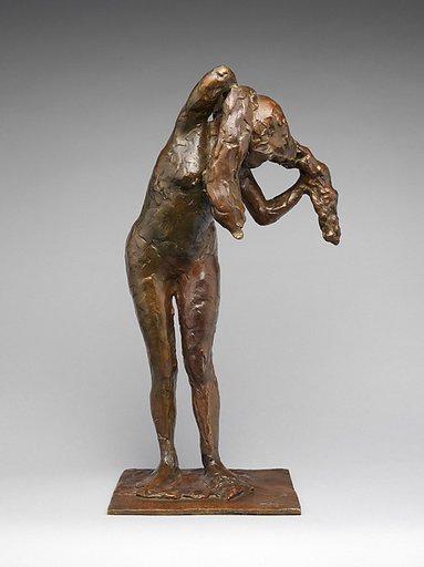 Woman Arranging her Hair