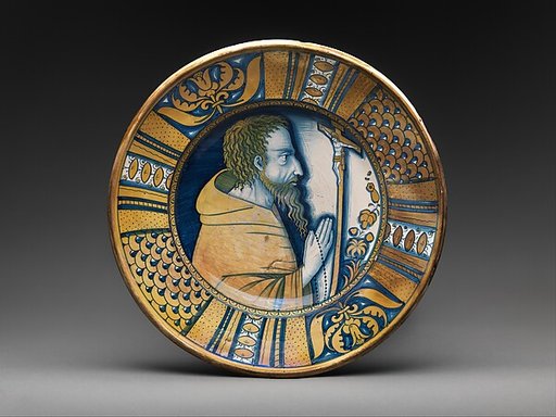 Dish with saint (Saint Francis?) or friar praying before crucifix