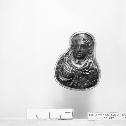 Woman carrying a jar