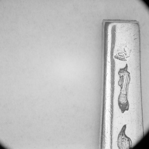 Section of a spoon handle