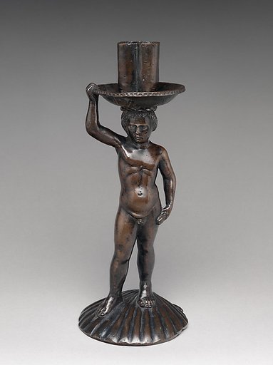 Boy on a shell, holding a candlestick
