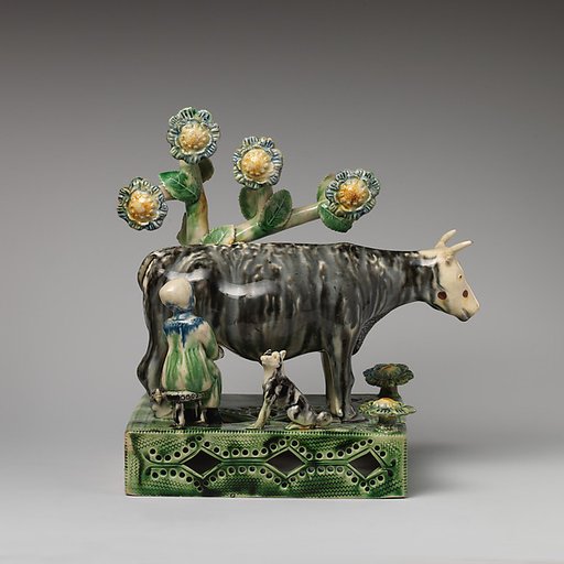 Milkmaid and cow with a dog