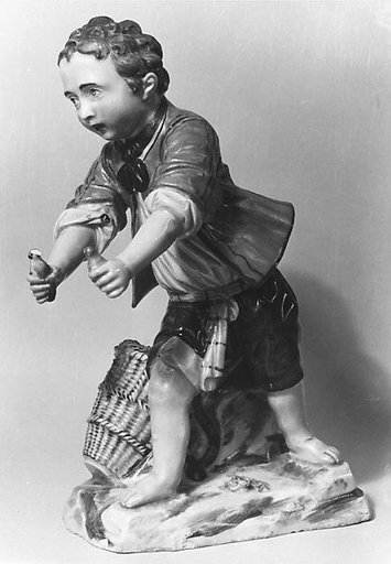 Boy holding birds