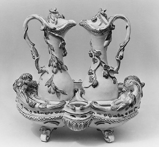 Cruet frame and two cruets with covers