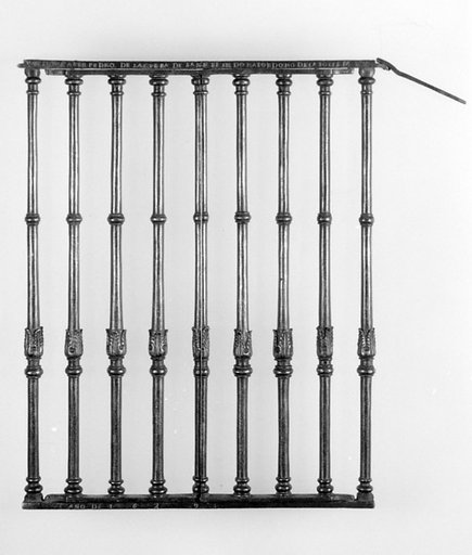 Part of a confessional grille