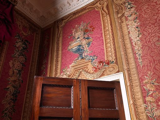 Two overdoor panels with vases
