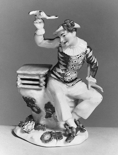 Harlequin with dove