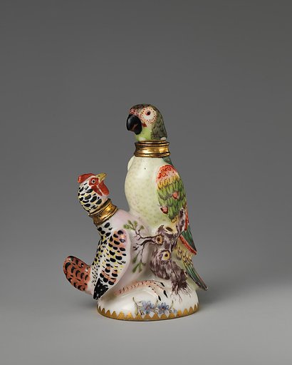 Parrot and rooster in a group