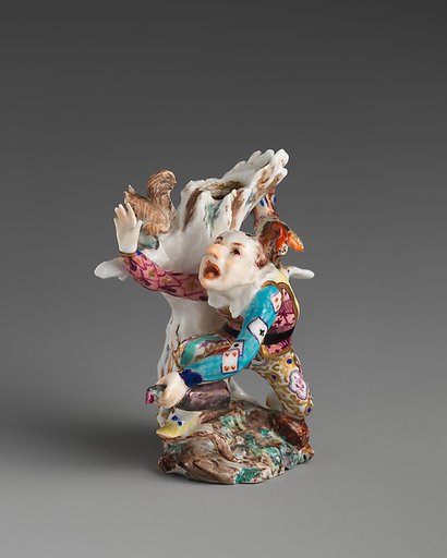 Harlequin and rooster
