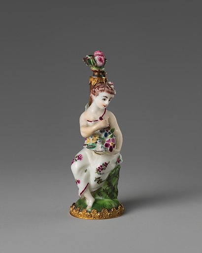 Girl with a basket of flowers