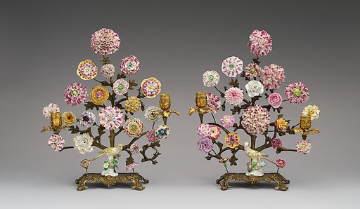 Pair of candelabra with porcelain flowers