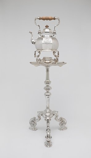 Teakettle, lamp, and table
