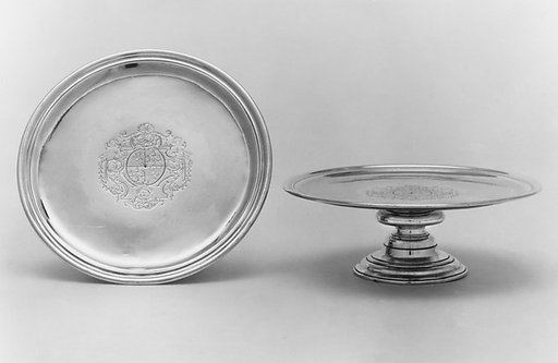 Pair of salvers on pedestal feet