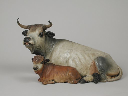 Cow and calf lying down