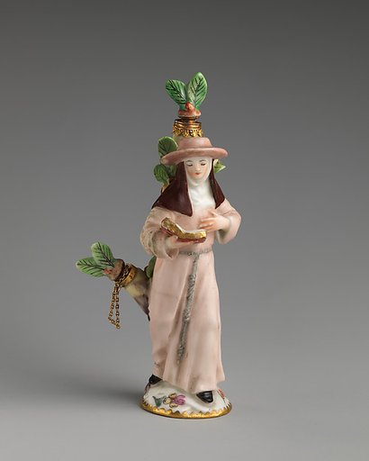 Scent bottle in the form of a nun reading a book