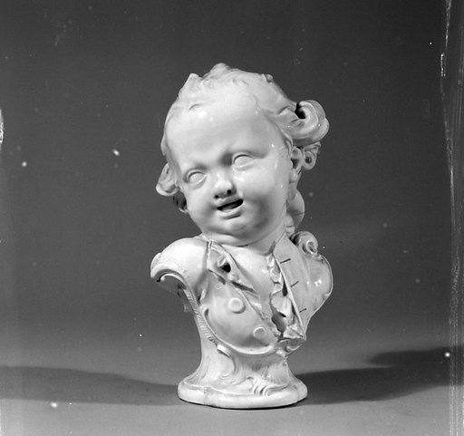 Bust of a laughing boy