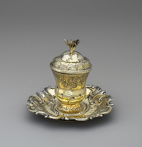 Urn-shaped inkwell with cover on stand