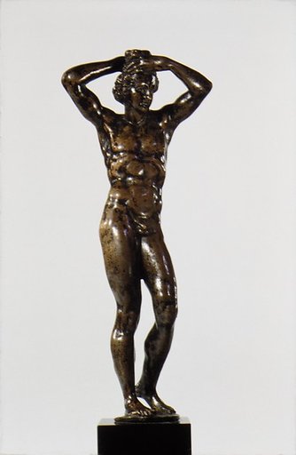 Male nude supporting a wreath on his head