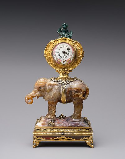Miniature clock in the form of an elephant supporting a watch case