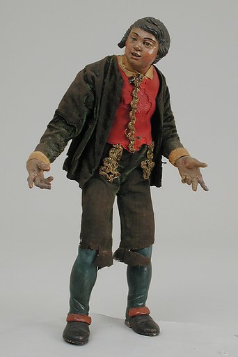 Standing man in velvet suit