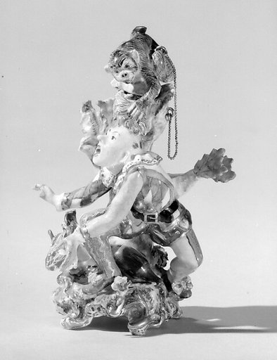 Harlequin and rooster