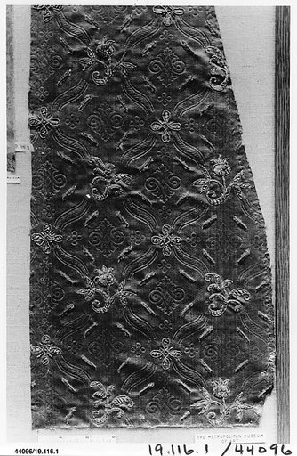 Fragment of satin with stamped, slashed and embroidered decoration