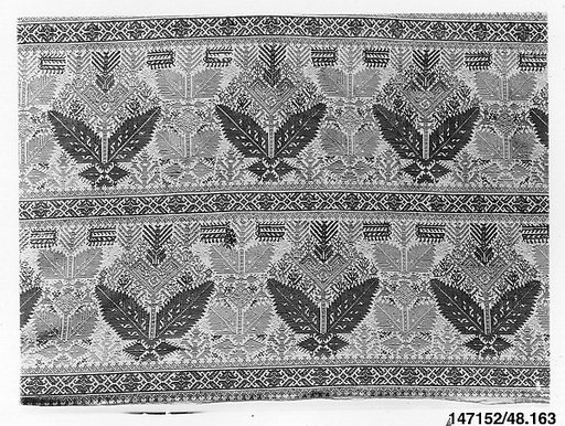 Part of a bed curtain