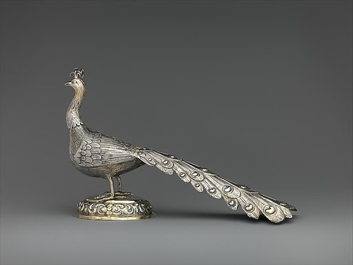 Table decoration in the form of a peacock