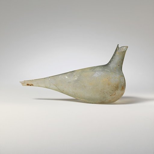 Glass bottle shaped like a bird