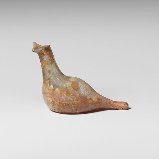 Glass bottle shaped like a bird