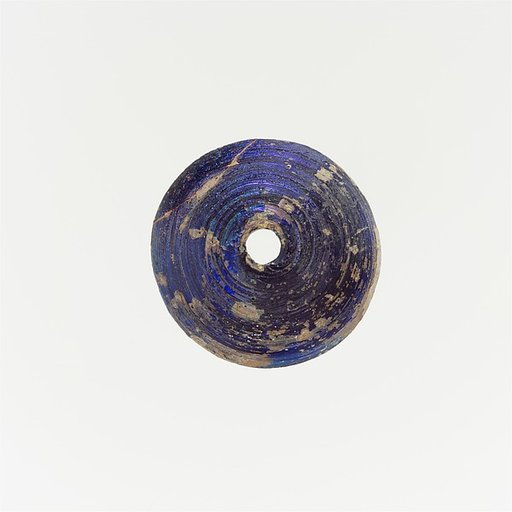 Glass spindle whorl