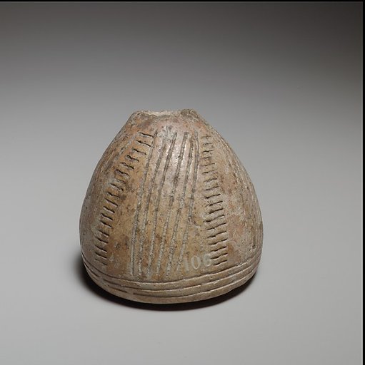 Conical-hemispherical spindle-whorl with flat base