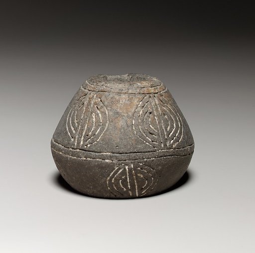 Terracotta biconical spindle-whorl