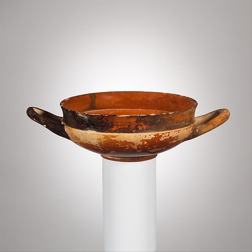 Terracotta stemless kylix (drinking cup)