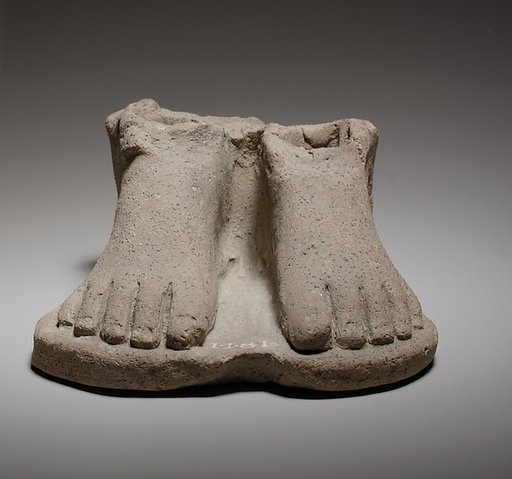 Feet on a plinth