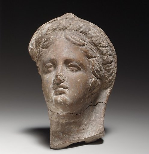Terracotta female head