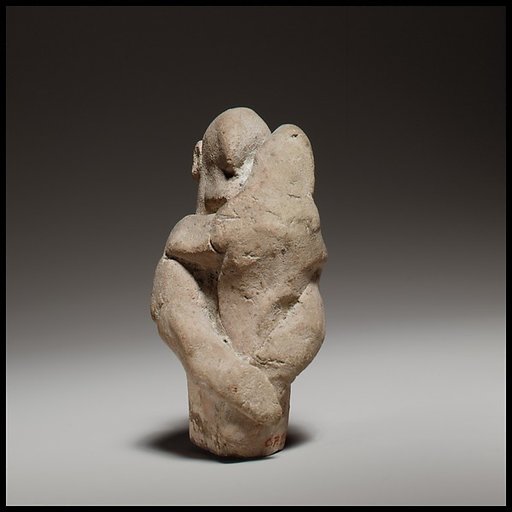 Two figures in a scene of childbirth