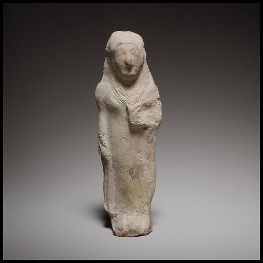 Standing female figurine holding a flower