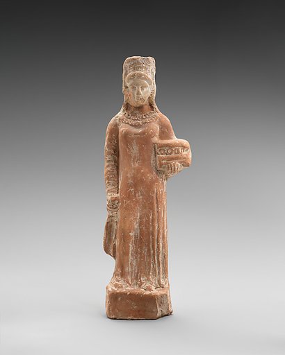 Terracotta figurine of a standing female votary holding a box