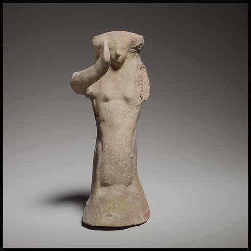 Seated female figurine of the dea gravida type