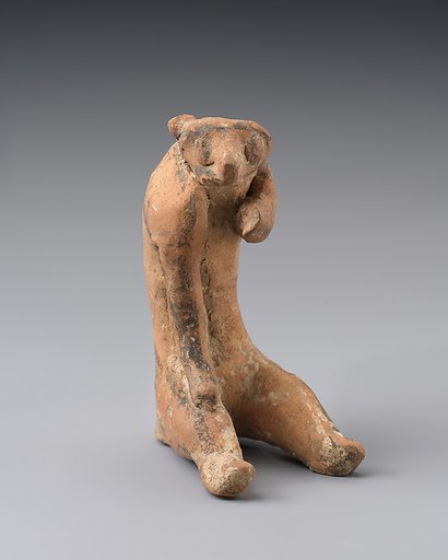 Terracotta statuette of a monkey or bear