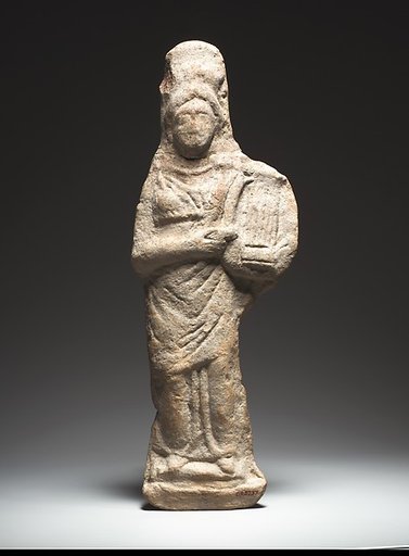 Standing female kithara player