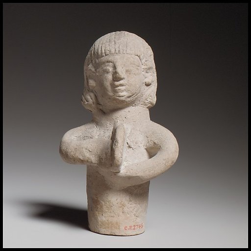 Standing female tambourine player